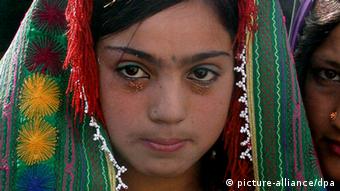 A 12 year old Afghan bride during the wedding ceremony in Herat on Sunday 25 December 2005. 