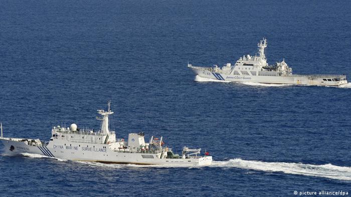 ©Kyodo/MAXPPP - 14/09/2012 ; NAHA, Japan - Photo from a Kyodo News aircraft shows the Chinese marine surveillance ship Haijian 51 (front) in Japanese territorial waters near the Japan-controlled Senkaku Islands in the East China Sea on Sept. 14, 2012. China also claims the islets and calls them the Diaoyu Islands. At back is a patrol ship of the Japan Coast Guard. (Kyodo)