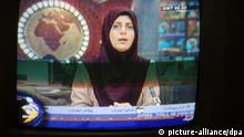 A female newsreader on Iranian TV, with headscarf Foto: Tilman Billing +++(c) dpa - Report+++ 