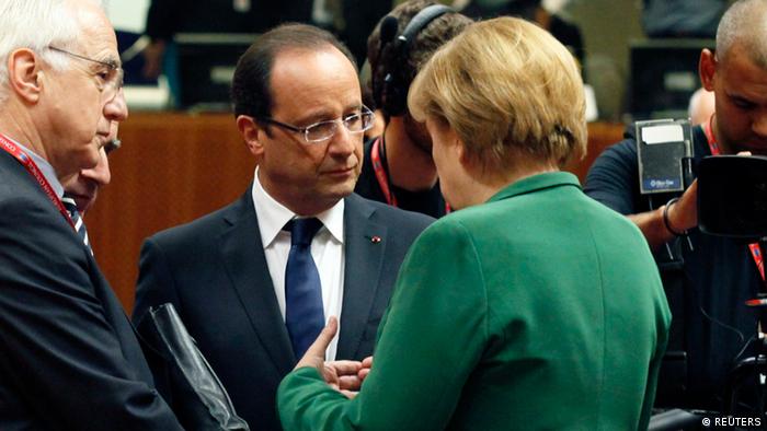 France's President Francois Hollande chats with Germany's Chancellor Angela Merkel(Photo: Reuters)