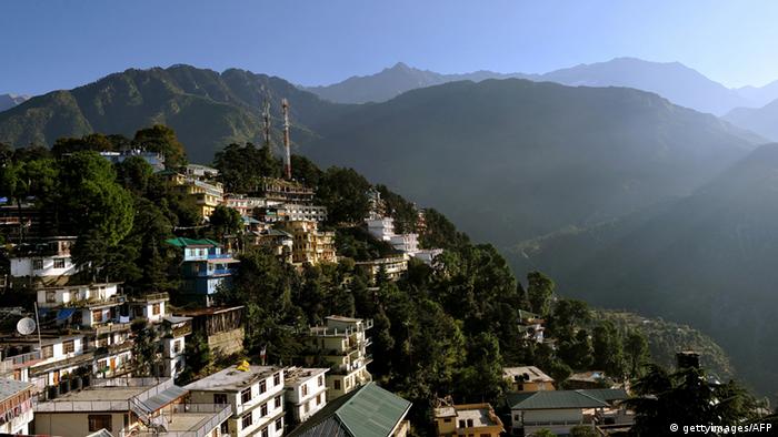 A view of the Dharamshala town is seen amidst the Dhauladhar range of mountains from the Namgyal Monastry on September 26, 2012. About 400 Tibetans from around the world are in the northern Indian hilltown of Dharamshala for the biggest gathering of exiles in four years called to highlight the plight of Tibetans under Chinese rule. AFP PHOTO/Manjunath KIRAN (Photo credit should read Manjunath Kiran/AFP/GettyImages) 