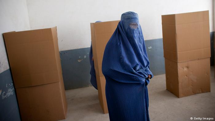An Afghan woman votes at a polling station for the parliamentary elections on September 18, 2010(Photo: Majid Saeedi/ Getty Images) 