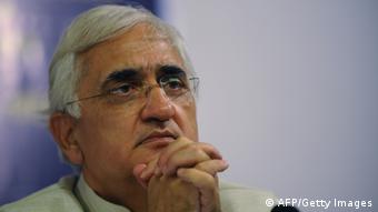 Indian Union Minister for Law and Justice, Salman Khurshid gestures during an interaction with Gujarat media representatives at the Ahmedabad Management Association (AMA) in Ahmedabad on June 13, 2012. In a first of its kind initiative, the Group of Union Ministers addressed a press conference in Ahmedabad covering various issues. AFP PHOTO / Sam PANTHAKY (Photo credit should read SAM PANTHAKY/AFP/GettyImages) 
