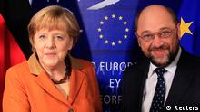 Germany's Chancellor Angela Merkel (L) is welcomed by European Parliament President Martin Schulz in Brussels (Photo: REUTERS/Yves Herman)