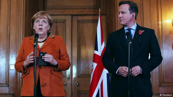 Britain's Prime Minister David Cameron speaks to the media with Germany's Chancellor Angela Merkel at Downing Street in central London November 7, 2012. 
Photo: REUTERS/POOL/Dan Kitwood