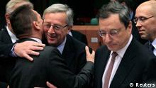 Euro Group chairman Jean-Claude Juncker (center) greets Greece's Finance Minister Yannis Stournaras (l), while European Central Bank (ECB) President Mario Draghi (second from right) looks on at a Euro Group meeting in Brussels in November, 2012. Copyright: REUTERS/Yves Herman 