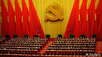 Delegates attend the closing session of 18th National Congress of the Communist Party of China at the Great Hall of the People in Beijing, November 14, 2012. REUTERS/Jason Lee (CHINA - Tags: POLITICS)