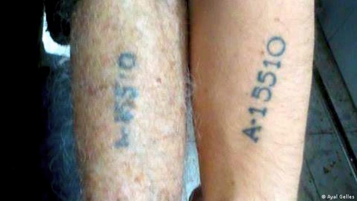 Ayal Gelles' arm on the right and his grandfather Avraham Nachshon's on the left
