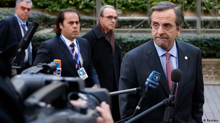 Greece's Prime Minister Antonis Samaras arrives at the EU council headquarters for an European Union leaders summit discussing the European Union's long-term budget in Brussels November 22, 2012. EU heads of state and governments will need to agree a first-ever cut in the bloc's long-term spending plans if they are to clinch a deal at a summit starting on Thursday, with the drive for austerity likely to trump all other concerns. REUTERS/Francois Lenoir (BELGIUM - Tags: POLITICS BUSINESS)