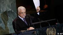 Palestinian President Mahmoud Abbas holds a letter requesting recognition of Palestine as a state as he addresses the United Nations General Assembly on Sept. 23, 2011. (AP Photo/Mary Altaffer)