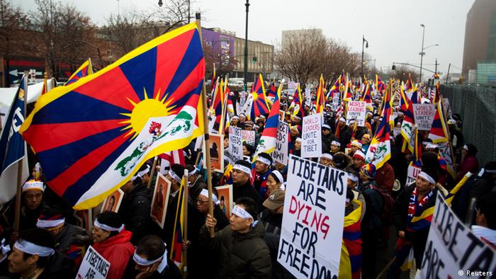 Protesters take part in a solidarity march from the Chinese Consulate to the United Nations (UN) Headquarters in support of Tibet in New York, December 10, 2012. The march also aims to brings to attention a string of self-immolations that have taken place in Tibet in protest of China's handling of the region. REUTERS/Lucas Jackson (UNITED STATES - Tags: CIVIL UNREST POLITICS)