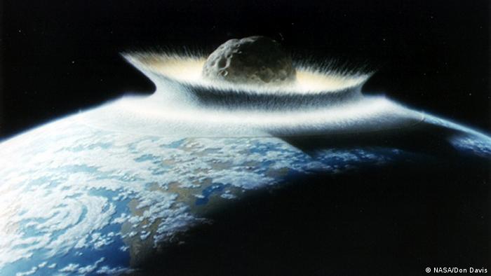 Artist rendition of asteroid smashing into Earth