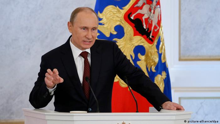 Russian President Vladimir Putin delivers his annual address to the members of the Russian Federal Assembly at the St. George Hall in the Kremlin in Moscow, Russia, 12 December 2012. 
pixel
