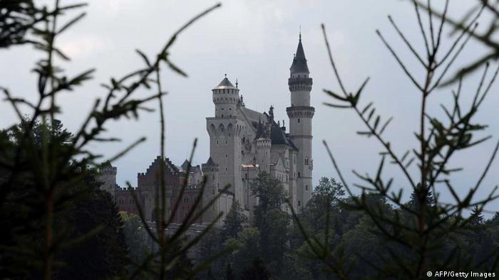 Photo of Neuschwanstein framed by tree branches
Photo: CHRISTOF STACHE/AFP/Getty Images
