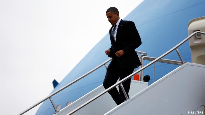 President Barack Obama exits Air Force one en route to Newtown
(Reuters/Kevin Lamarque)