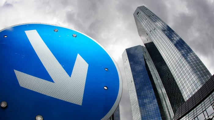 The headquarters of Deutsche Bank is seen next to a traffic sign in Frankfurt, Germany
Photo:Michael Probst/AP/dapd).
