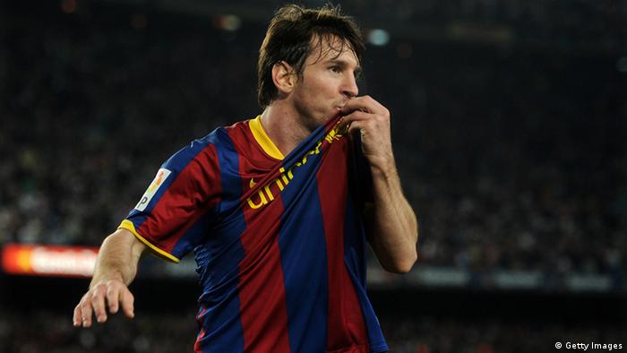 BARCELONA, SPAIN - APRIL 09: Lionel Messi of Barcelona kisses his shirt after scoring his second goal during the la Liga match between FC Barcelona and UD Almeria at the Camp Nou stadium. (Photo by Jasper Juinen/Getty Images)