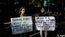 Indian women hold placards outside the residence of Delhi Chief Minister Sheila Dikshit during a protest over the gang rape of a woman in New Delhi, India, Wednesday, Dec. 19, 2012. Lawmakers, rights groups and citizens across India expressed outrage Wednesday over the gang rape of a woman on a bus in New Delhi and are urging the government to crack down on crimes against women. The outpouring of anger is unusual in a country where attacks against women are often ignored and rarely prosecuted. (AP Photo/Manish Swarup)