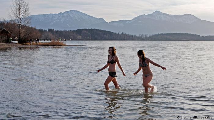 Two swimmers enjoy the warm weather in southern Germany
