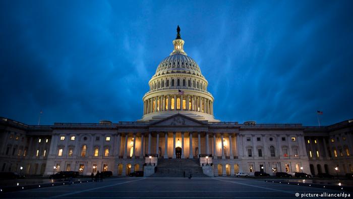  The US Capitol is pictured on the night the US appears set to go over the so-called fiscal cliff in Washington (Photo via dpa)