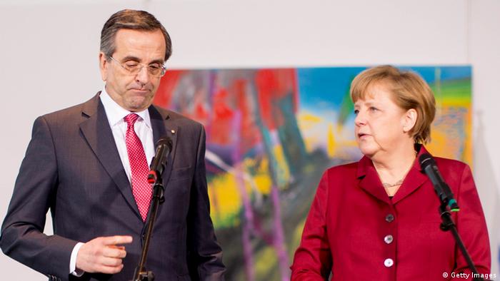 German Chancellor Angela Merkel and Greek Prime Minister Antonis Samaras
(Photo by Carsten Koall/Getty Images) 