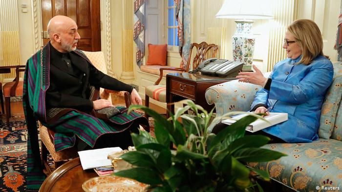 President of Afghanistan Hamid Karzai (L) sits with U.S. Secretary of State Hillary Clinton in her outer office at the State Department in Washington, January 10, 2013. REUTERS/Jonathan Ernst (UNITED STATES - Tags: POLITICS)