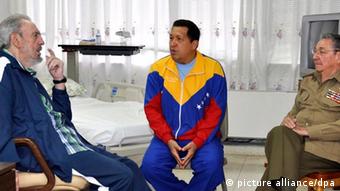 Former Cuban President Fidel Castro (L) and his brother and current Cuban leader Raul Castro (R) visiting Chavez (C) in hospital in 2011. 
(Photo: EPA/Cubadebate)