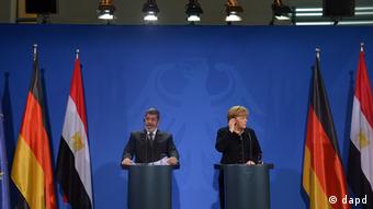 Morsi with Angela Merkel
Foto: Oliver Lang/dapd
