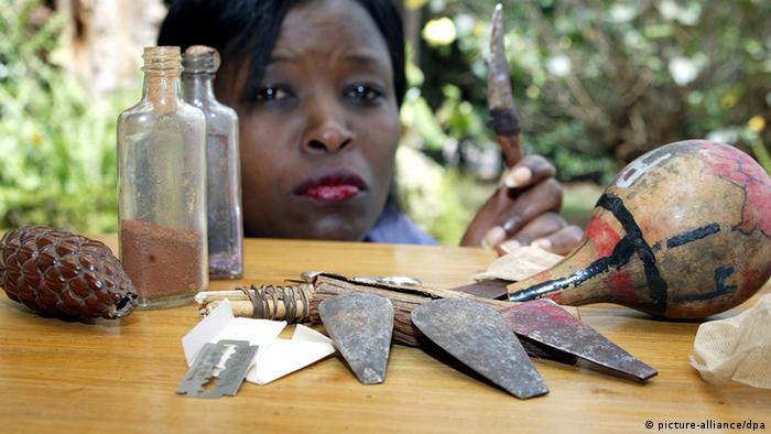 A worker with some of the tools used for FGM in Africa. (Photo: Ursula Düren/dpa) 