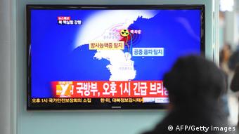South Korean passengers watch TV news reporting North Korea's apparent nuclear test, at the Seoul train station on February 12, 2013. (Photo: KIM JAE-HWAN/AFP/Getty Images)