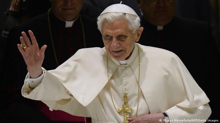 Pope Benedict XVI waves as he arrives for his weekly general audience on February 13
FILIPPO MONTEFORTE/AFP/Getty Images