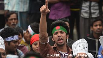 A Bangladeshi youth shouts slogans as Bangladeshi social activists and bloggers participate in a demonstration demanding the death sentence for the country's war criminals during a nationwide strike in Dhaka on February 18, 2013. (Photo:MUNIR UZ ZAMAN/AFP/Getty Images)
