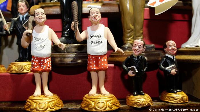 Christmas figurines showing Italian Prime Minister Silvio Berlusconi (L) wearing underwears reading bunga bunga and created by Gennaro Di Virgilio are displayed in a shop downtown Naples on November 27, 2010. CARLO HERMANN/AFP/Getty Images)