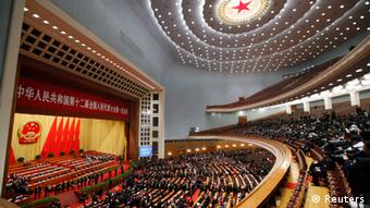 A general view inside the Great Hall of the People during the fifth plenary meeting of National People's Congress (NPC) in Beijing, March 15, 2013. REUTERS/Barry Huang (CHINA - Tags: POLITICS)