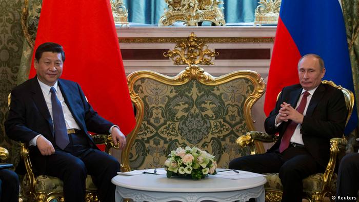 Russia's President Vladimir Putin (R) meets with his Chinese counterpart Xi Jinping at the Kremlin in Moscow March 22, 2013. REUTERS/Alexander Zemlianichenko/Pool (RUSSIA - Tags: POLITICS)