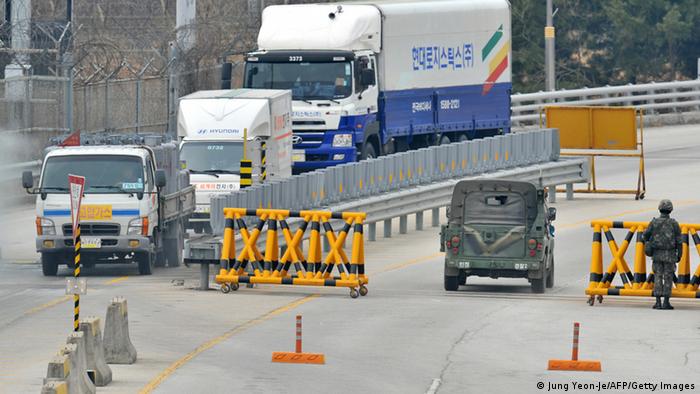 South Korean trucks arrive from North Korea's Kaesong Industrial Complex at a military check point of the inter-Korean transit office in Paju near the Demilitarized Zone (DMZ) dividing the two Koreas on April 1, 2013. South Korean workers and cargo on April 1, headed for the Kaesong Industrial Complex without a hitch despite North Korea's recent threat to close the joint industrial zone in the communist country. AFP PHOTO / JUNG YEON-JE (Photo credit should read JUNG YEON-JE/AFP/Getty Images)