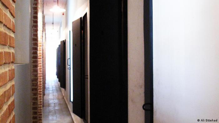 Hallway with cell doors at Qasr Prison in Tehran, a political prison that has been transformed into a museum