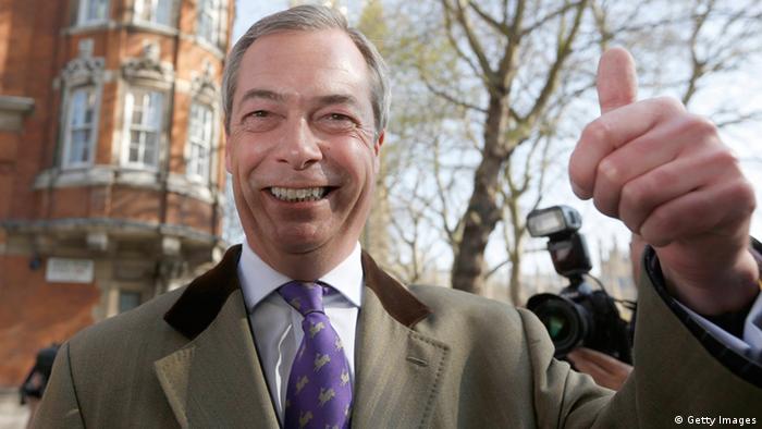 A picture of UKIP party chief, Nigel Farage making the thumb's up signal to express pleasure or success.