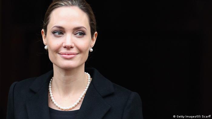 LONDON, ENGLAND - APRIL 11: Actress Angelina Jolie leaves Lancaster House after attending the G8 Foreign Minsters' conference on April 11, 2013 in London, England. G8 Foreign Ministers are holding a two day meeting where they will discuss the situation in the Middle East; including Syria and Iran, security and stability across North and West Africa, Democratic People's Republic of Korea and climate change. British Foreign Secretary William Hague will also highlight five key policy priorities. (Photo by Oli Scarff/Getty Images)