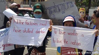 Two garment workers protesting in Phnom Penh
