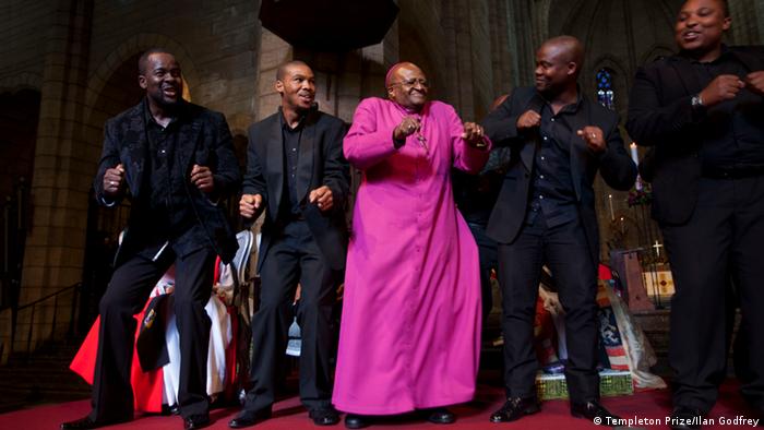 Archbishop Emeritus Desmond Tutu with members of the Cape Town Opera Voice of the Nation Ensemble, at the Templeton Prize celebration at St. George’s Cathedral in Cape Town on April 11, 2013.
(Photo credit: Templeton Prize: / Ilan Godfrey)