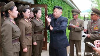 North Korean leader Kim Jong-un (C) inspects Korean People's Army Unit 405 at an undisclosed location in this picture released by the North's KCNA news agency in Pyongyang May 21, 2013. REUTERS/KCNA (NORTH KOREA - Tags: POLITICS MILITARY) ATTENTION EDITORS - THIS PICTURE WAS PROVIDED BY A THIRD PARTY. REUTERS IS UNABLE TO INDEPENDENTLY VERIFY THE AUTHENTICITY, CONTENT, LOCATION OR DATE OF THIS IMAGE. FOR EDITORIAL USE ONLY. NOT FOR SALE FOR MARKETING OR ADVERTISING CAMPAIGNS. THIS PICTURE IS DISTRIBUTED EXACTLY AS RECEIVED BY REUTERS, AS A SERVICE TO CLIENTS