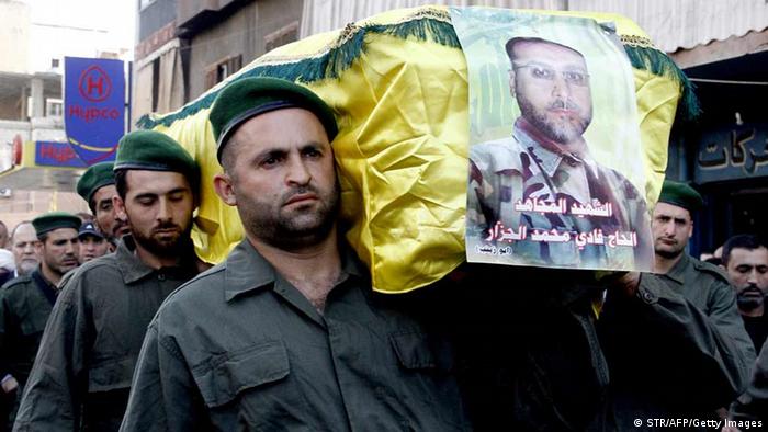 Members of Lebanon's Hezbollah carry a coffin STR/AFP/Getty Images)