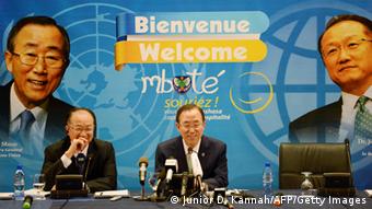 World Bank President Jim Yong Kim and UN secretary general Ban Ki-moon against a backdrop saying welcome in different languages (Photo: Junior D. Kannah/AFP/Getty Images) 