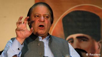 Prime Minister Nawaz Sharif speaks to his party workers during a seminar in Lahore, to mark the 14th anniversary of Pakistan's first successful nuclear test in 1999, May 28, 2013
(Photo: REUTERS/Mohsin Raza)