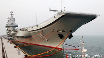  Liaoning aircraft carrier berths at a naval base in China. 