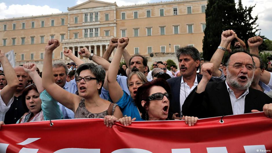 Anti-austerity protesters and parliamentarians of the anti-bailout radical leftist SYRIZA party participate in a rally in Athens, July, 16, 2013, during a 24-hour general strike. Trains ground to a halt and hospitals worked with emergency staff as Greek workers went on strike on Tuesday in protest at government plans to fire thousands of public sector employees. REUTERS/John Kolesidis (GREECE - Tags: POLITICS BUSINESS CIVIL UNREST)