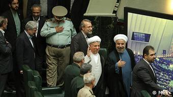 Inauguration of Hassan Rouhani in Parliament, Hassan Rouhani is an Iranian politician, Shia Mujtahid, lawyer, academic and diplomat, who is currently the president of Iran. Right to left: Ali akbar Velazati, Gholam Ali Aadad Adel, Mohammad Reza Aref, Mohammad Bagher Ghalibaf, Saeid Jalili
(3 August 2013)
Quelle: Mehr
