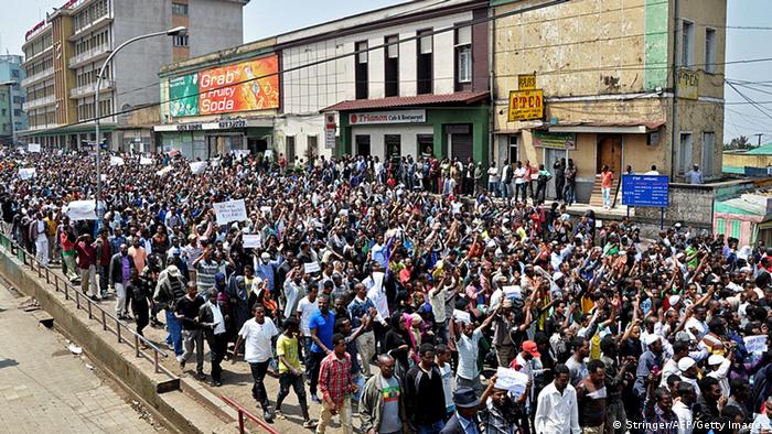 Thousands of Ethiopian opposition activists demonstrate in Addis Ababa on June 2, 2013. The protests were the largest in the country since post-election violence in 2005, in which 200 people were killed and hundreds more arrested. The activists have vowed to press ahead with demonstrations calling for government reforms and the release of political prisoners. The demonstrations were organised by the newly-formed Blue Party opposition group. Government spokesman Bereket Simon said up to 4,000 people joined Sunday's demonstration, while some observers put the number at 10,000. AFP PHOTO/STRINGER (Photo credit should read STRINGER/AFP/Getty Images) 