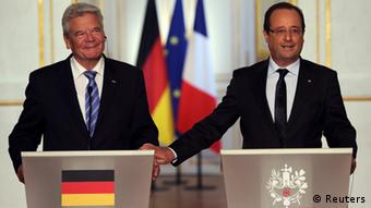 Gauck, pictured here with French President Hollande, is Germany's head of state